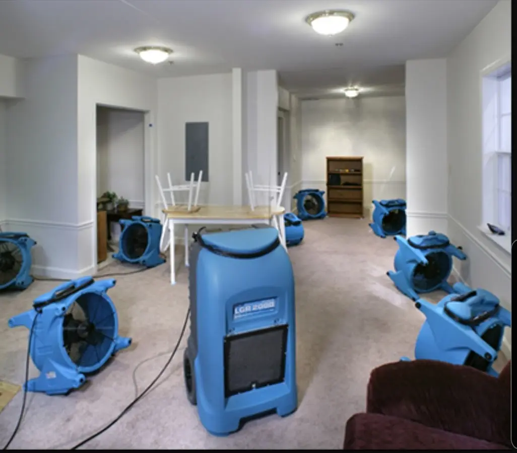 Air movers and dehumidifier setup for Water Extraction & Removal in Upper Grand Lagoon
